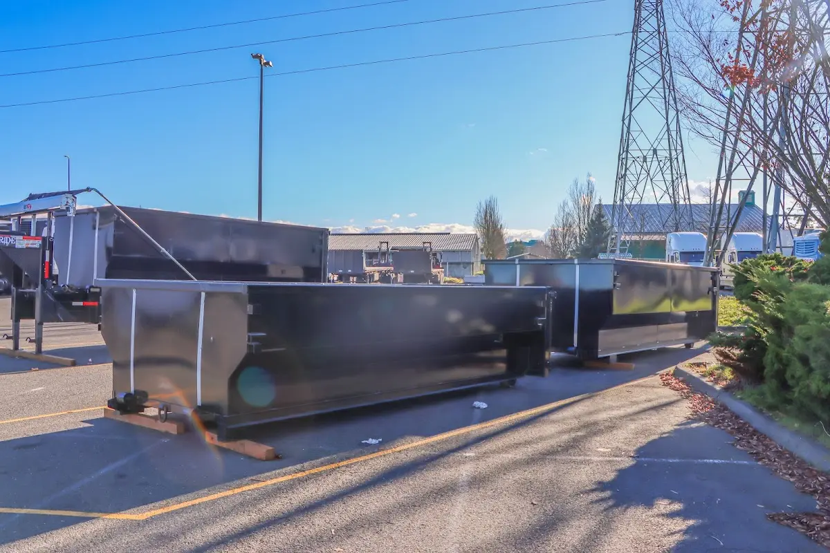Roll-off dumpster ready for waste disposal at job site for 15 Yard Dumpster Rental in Corcoran